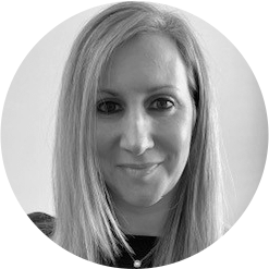 Black and white, circle-cropped headshot of Rachel W, EVP, Strategic Client Engagement